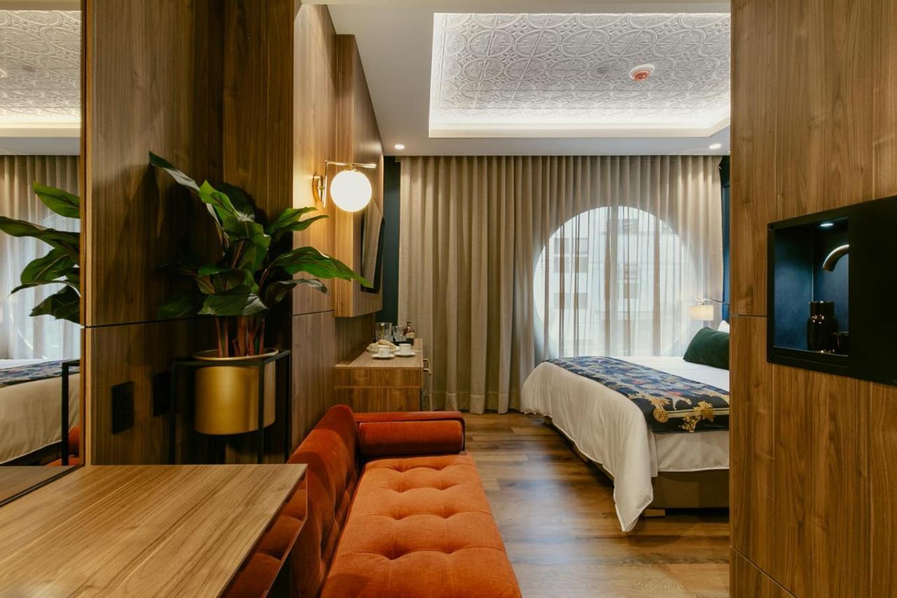 Hotel Marquee ميديلين المظهر الخارجي الصورة A room at the hotel