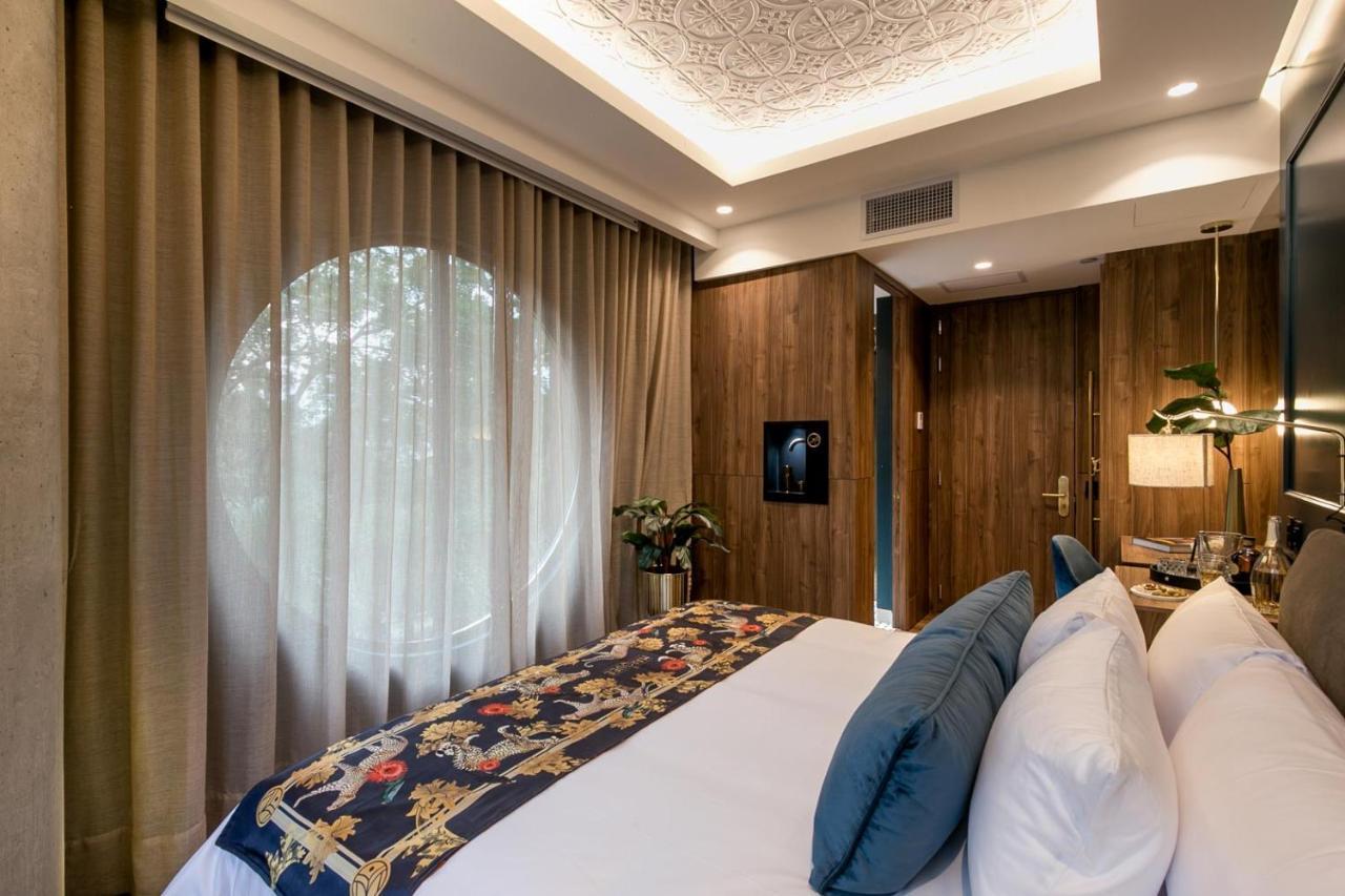 Hotel Marquee ميديلين المظهر الخارجي الصورة Deluxe Room