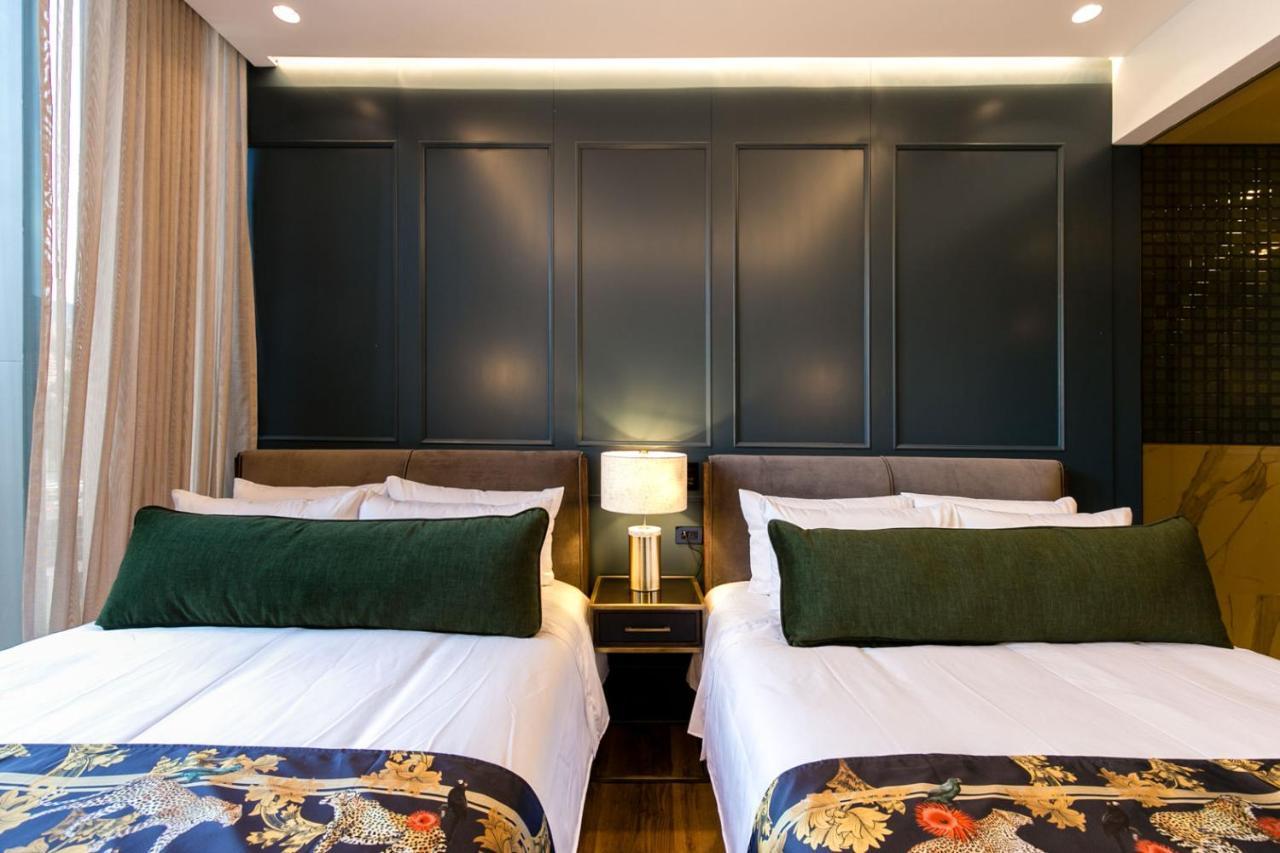 Hotel Marquee ميديلين المظهر الخارجي الصورة Deluxe Room