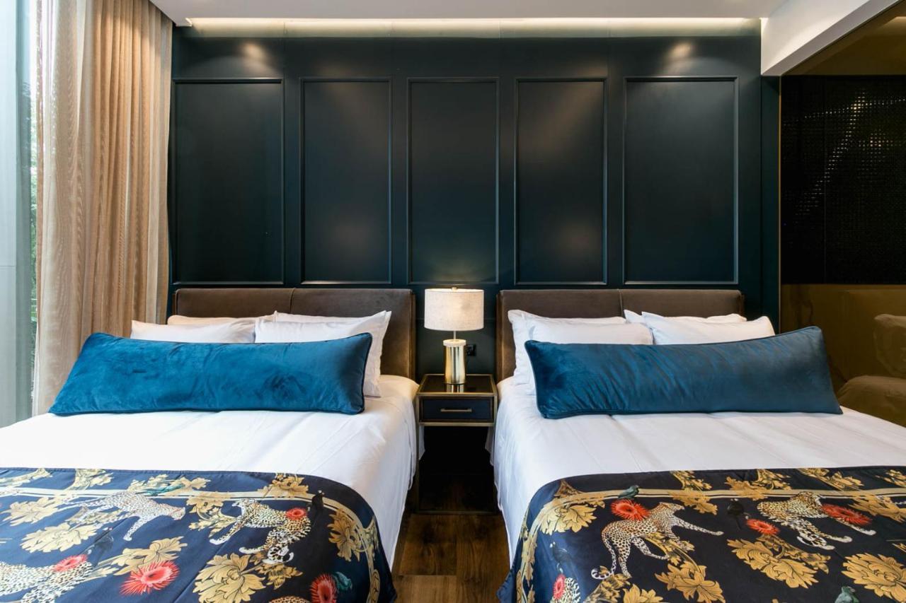Hotel Marquee ميديلين المظهر الخارجي الصورة Deluxe Room