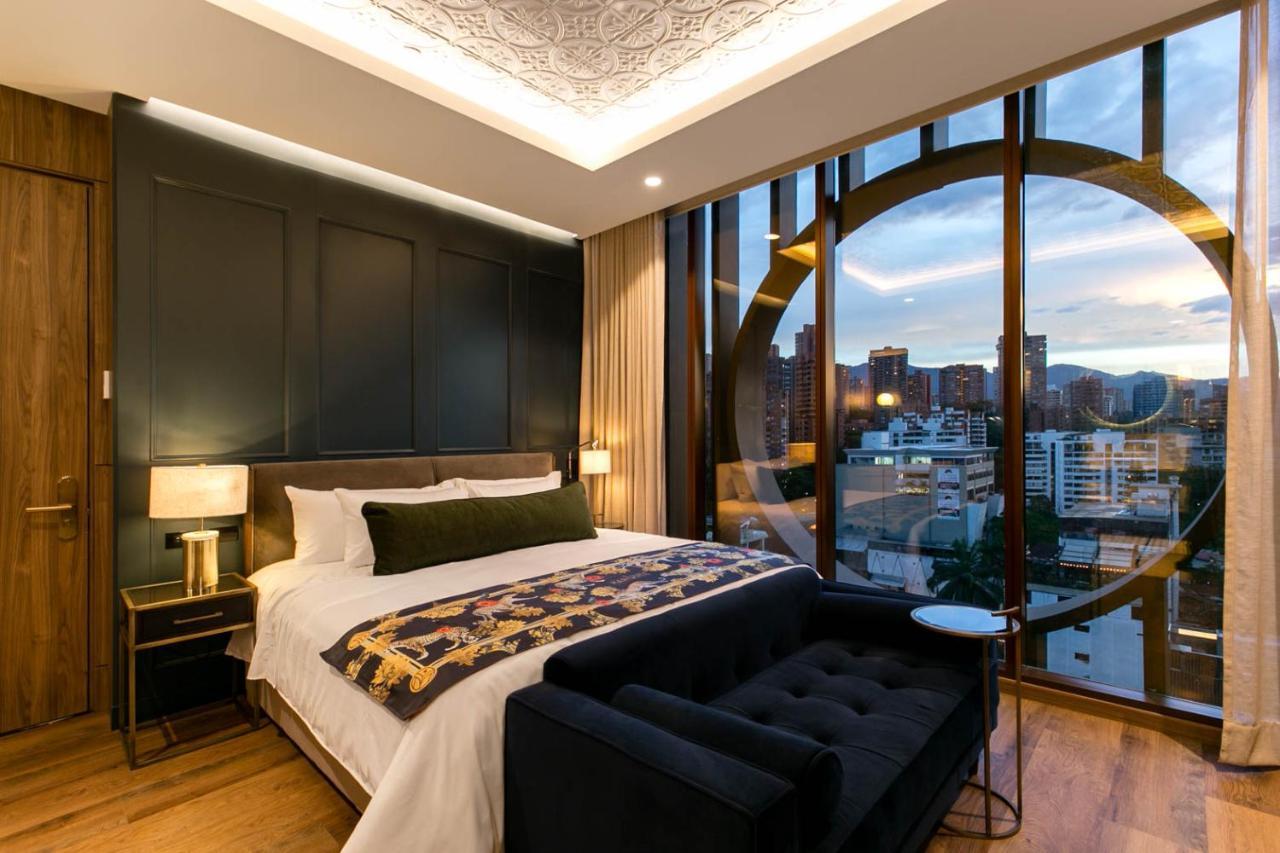 Hotel Marquee ميديلين المظهر الخارجي الصورة A bedroom at the hotel