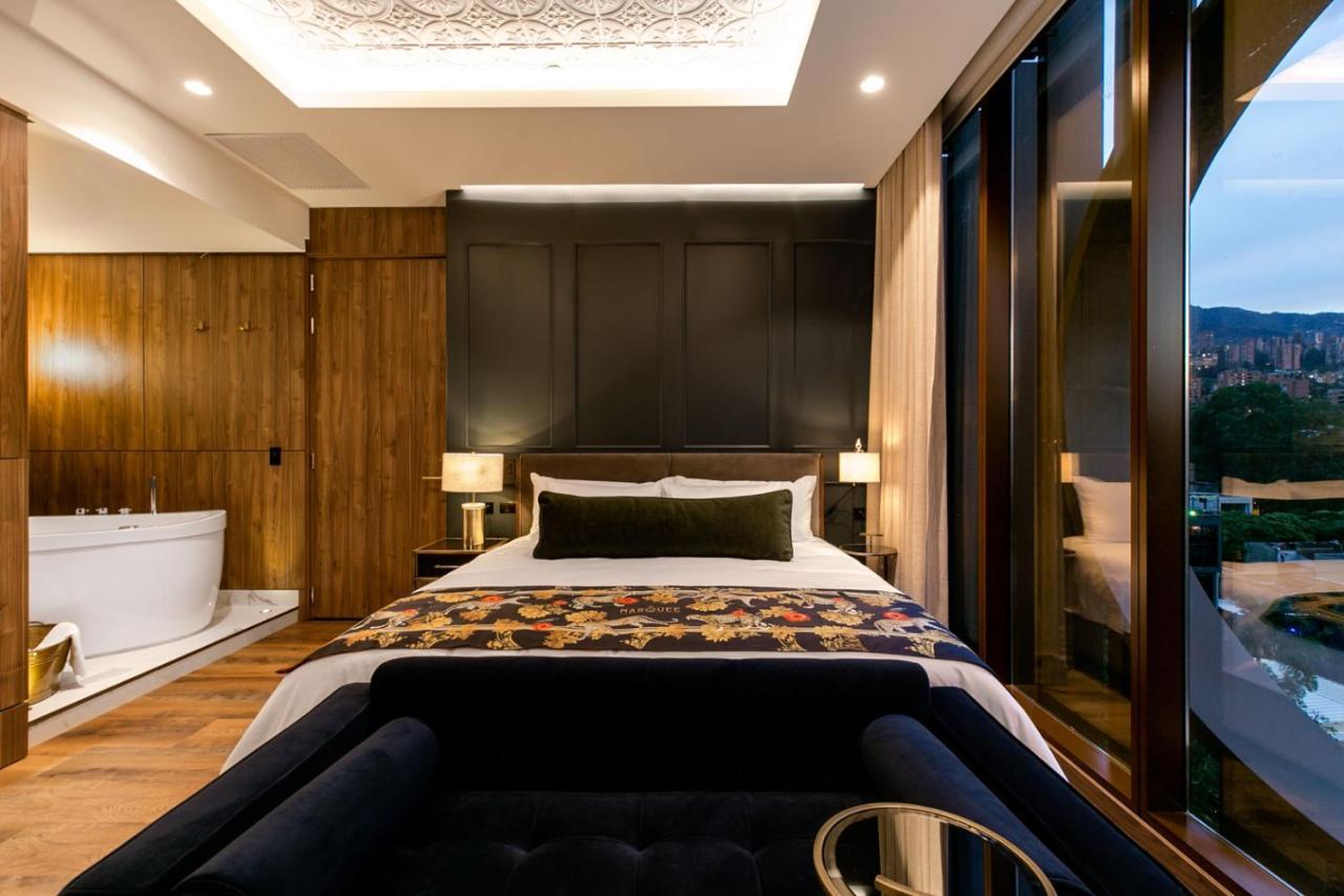 Hotel Marquee ميديلين المظهر الخارجي الصورة The hotel's suites
