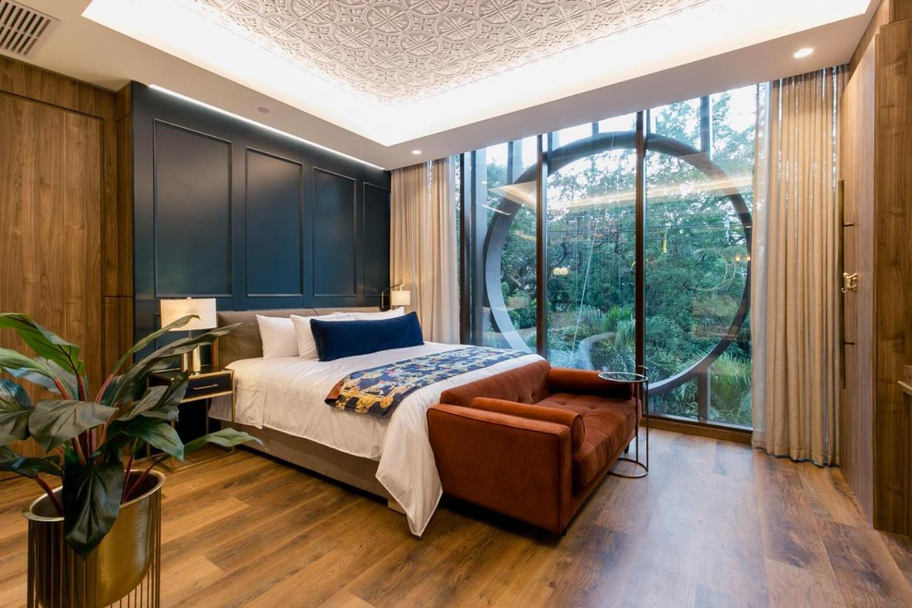Hotel Marquee ميديلين المظهر الخارجي الصورة A bedroom at the hotel