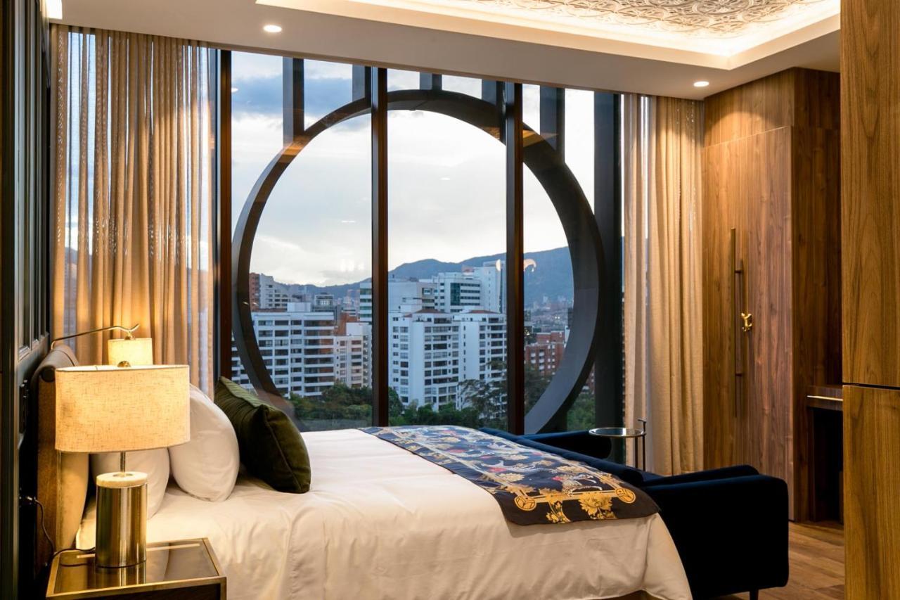 Hotel Marquee ميديلين المظهر الخارجي الصورة A bedroom at the hotel