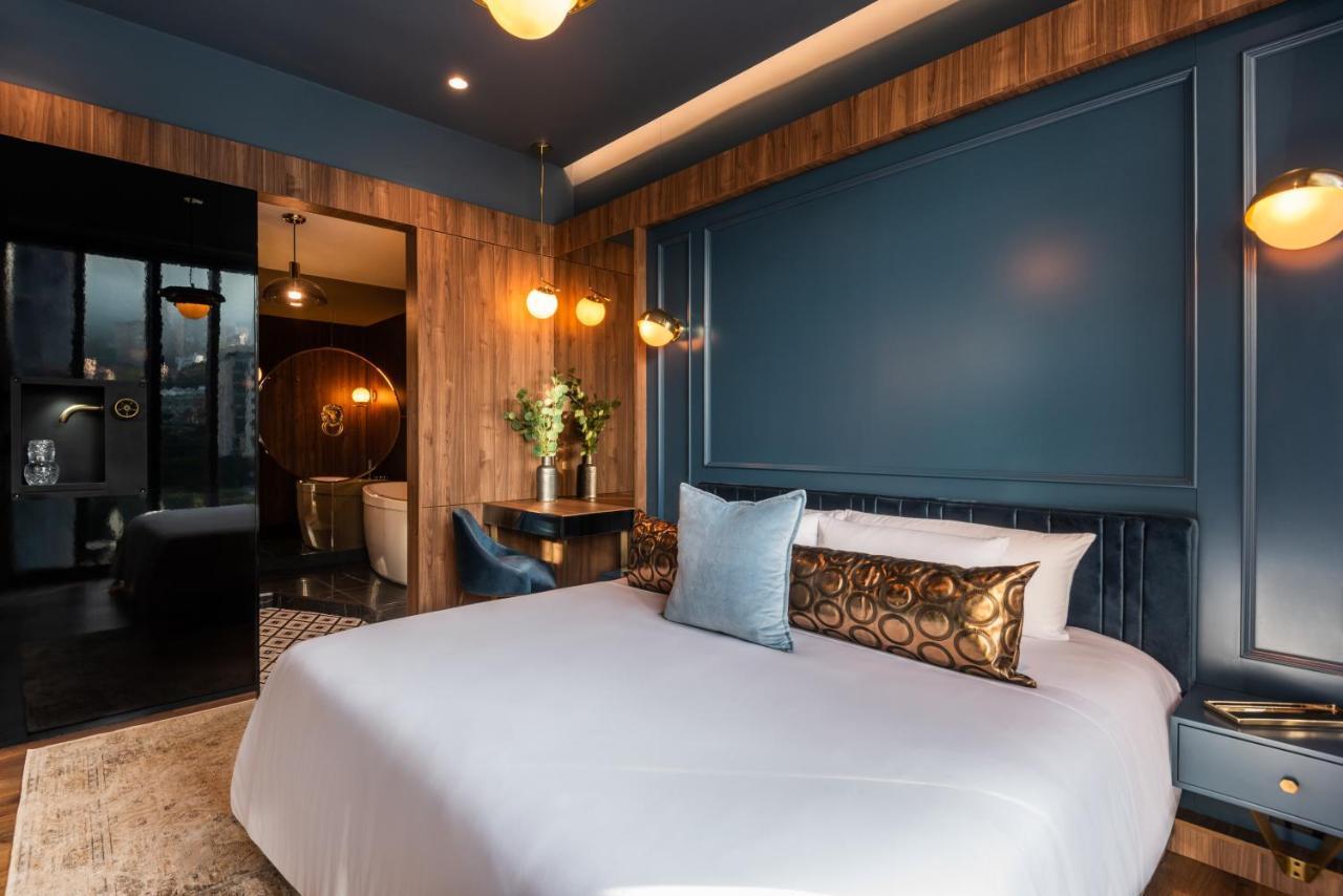 Hotel Marquee ميديلين المظهر الخارجي الصورة Deluxe Room